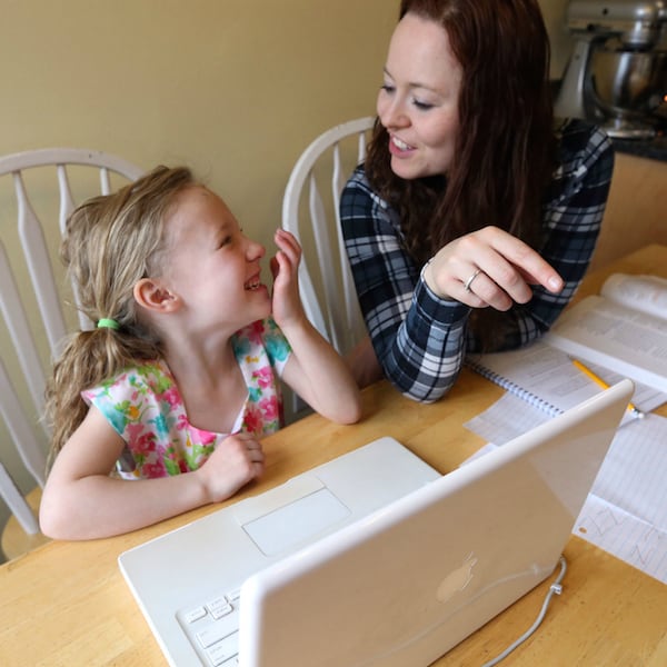 Nelina Moore, 5, does UPSTART preschool work at home with her mother Deborah Moore in West Valley City on Wednesday, April 8, 2015.