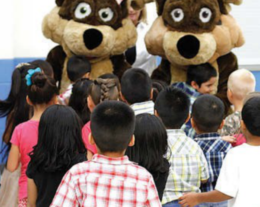 Waterford characters Rusty & Rosy visit Lamar CISD students at their GROW Project graduation.
