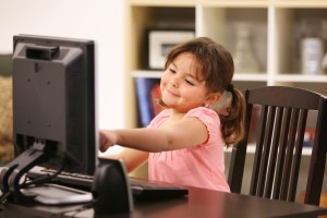 young girl on the computer