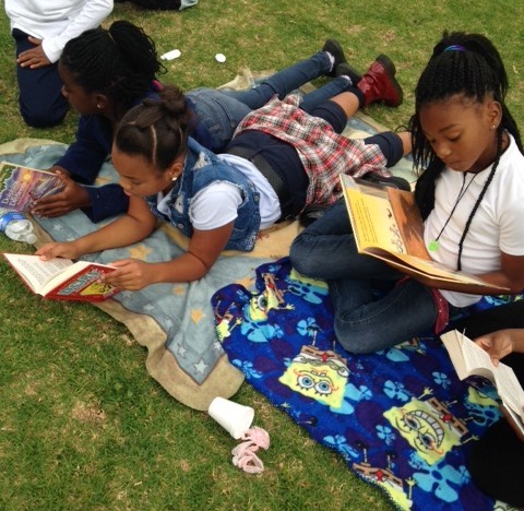 Students enjoying their Book-nic outside of the school library.