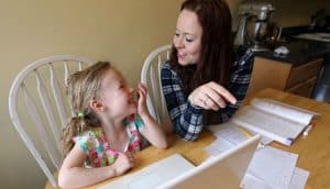 Nelina Moore, 5, does UPSTART preschool work at home with her mother Deborah Moore in West Valley City on Wednesday, April 8, 2015.