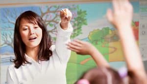 teacher calling on student who raised hand