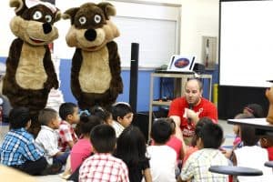 Teacher with Waterford students at after school program