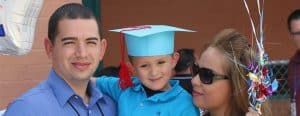 parents with kindergarten graduate