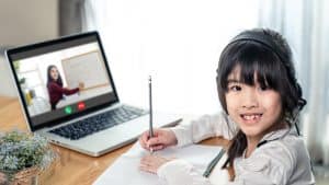 Student watching teacher's back to school night online