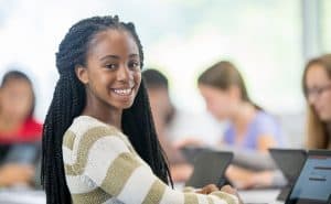 Student at a computer in class.