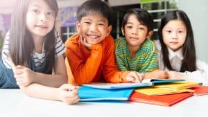 Asian American students having fun in the classroom