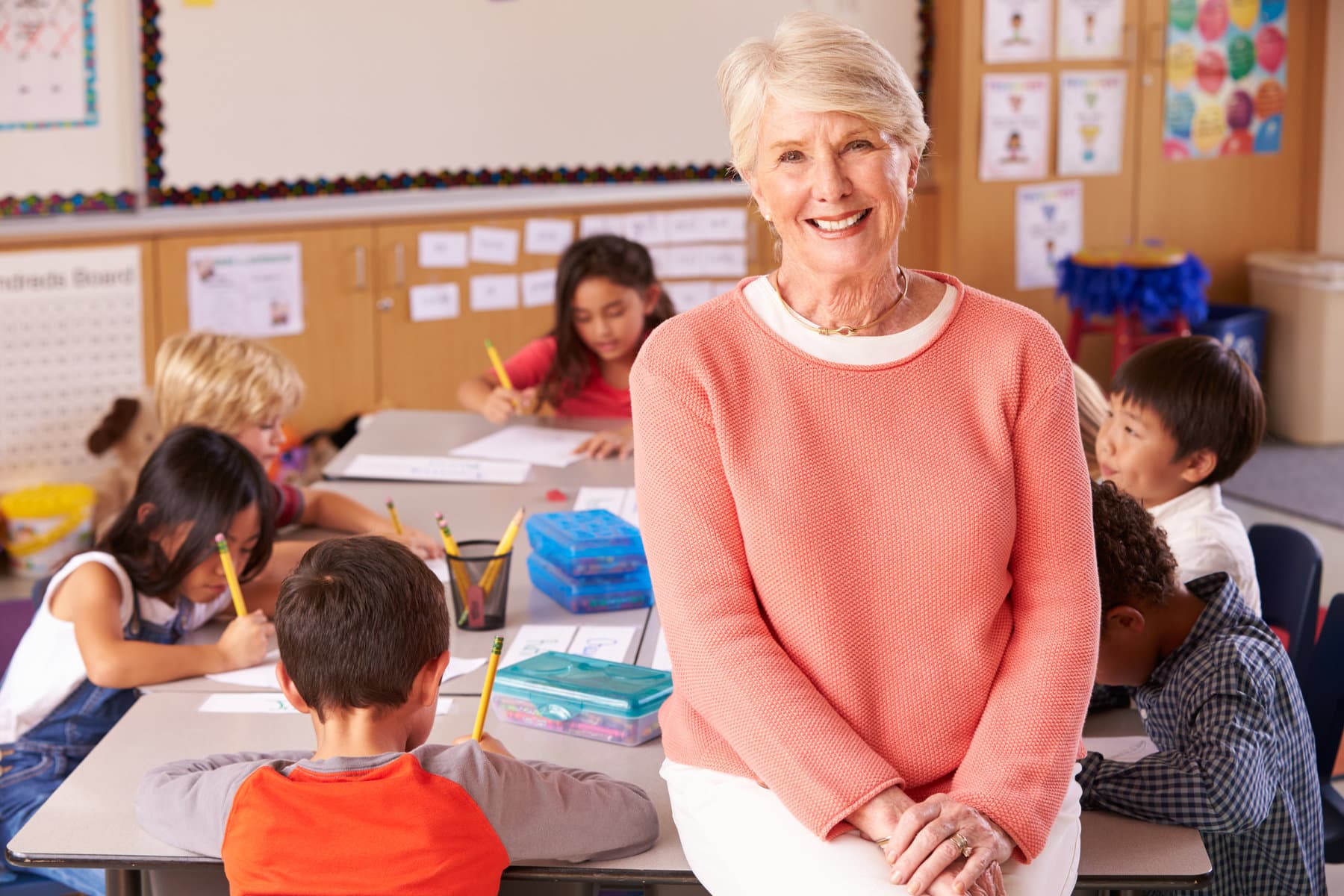 elementary teacher smiling in front of camera