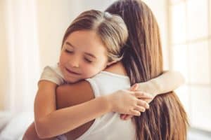 Hugging and comforting a child