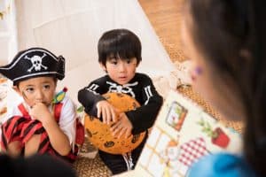 Children hearing a spooky story