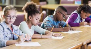 Elementary school students taking a test