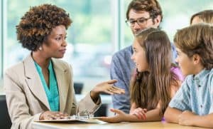 teacher meets with family