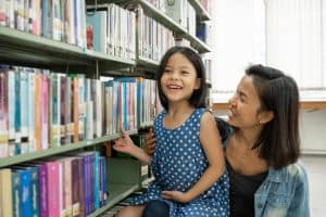 photo of a mother and child at a library