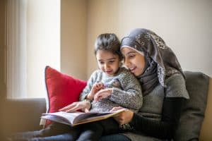 mother and child reading a book