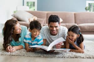 family reading a book