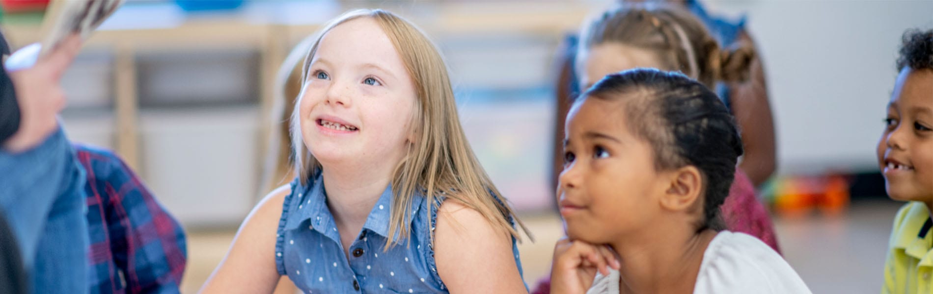 students listening to teacher in class