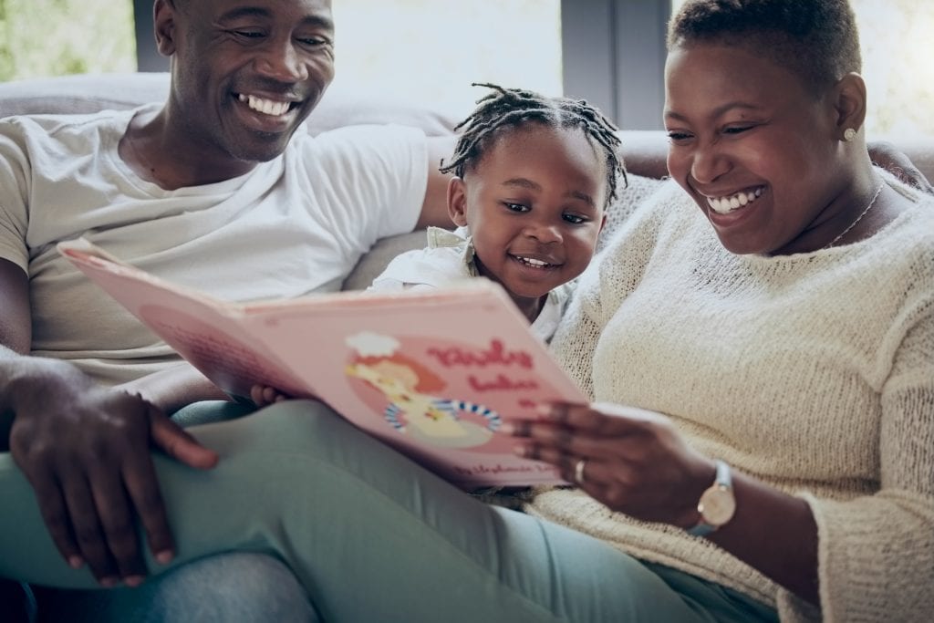 a family reading a book
